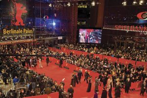 Guests arrive for the screening of "The Grand Budapest Hotel" presented in the Berlinale Competition of the 64rd Berlinale Film Festival and opening ceremony in Berlin, on February 6, 2014. The 64rd Berlinale, the first major European film festival of the year, starts on February 6, 2014 with 24 international productions screening in the main showcase. AFP PHOTO / POOL / TIM BRAKEMEIERTIM BRAKEMEIER/AFP/Getty Images