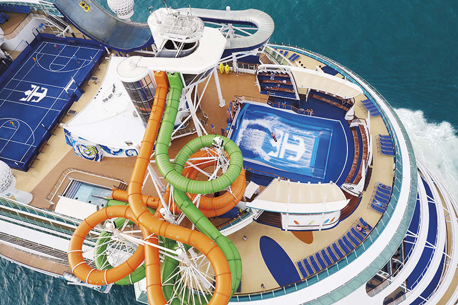 LB, Liberty of the Seas, aerial, exterior during the day, overhead rear side view, aft, port side, showing ship features, Tidal Wave, Flow Rider, onboard surfing, water slides, Perfect storm, basketball court