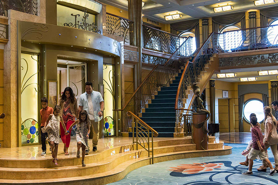 The three-deck atrium lobby on the Disney Wonder features Art Nouveau-inspired details reminiscent of the Golden Age of cruising. A bronze statue of Ariel from the classic Disney film ìThe Little Mermaidî is a focal point and a favorite photo location for guests. (Matt Stroshane, photographer)